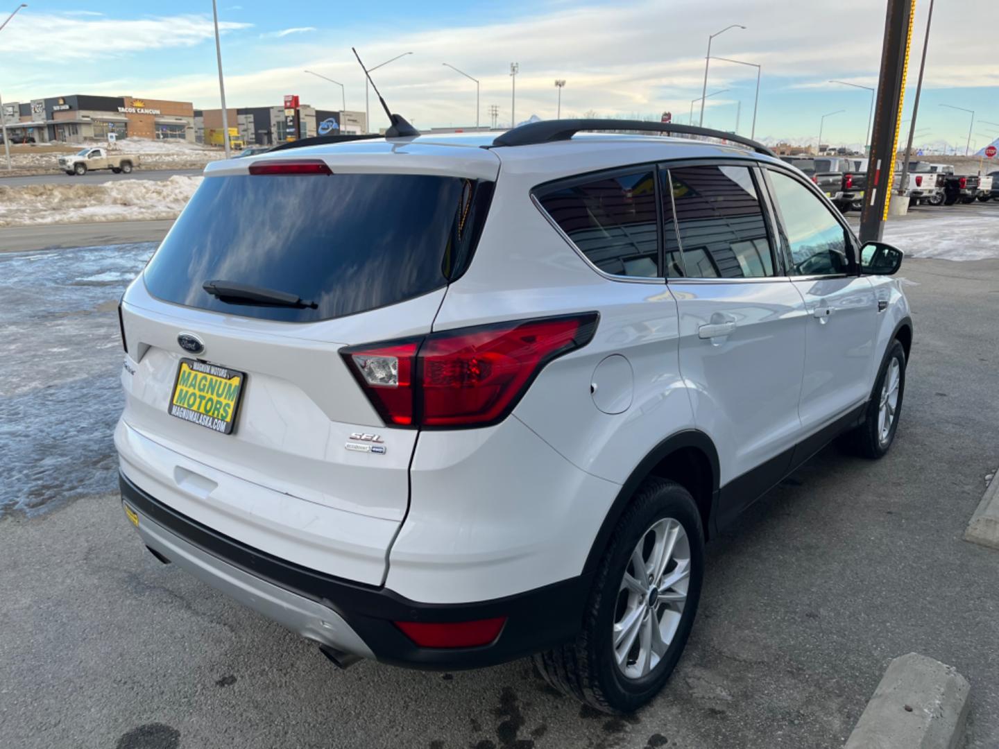 2019 White Ford Escape SEL 4WD (1FMCU9HD0KU) with an 1.5L L4 DOHC 16V engine, 6A transmission, located at 1960 Industrial Drive, Wasilla, 99654, (907) 274-2277, 61.573475, -149.400146 - Photo#5